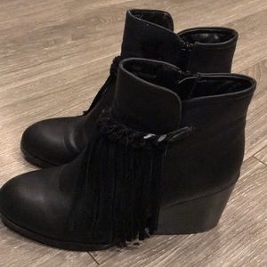 Black ankle boots with fringe